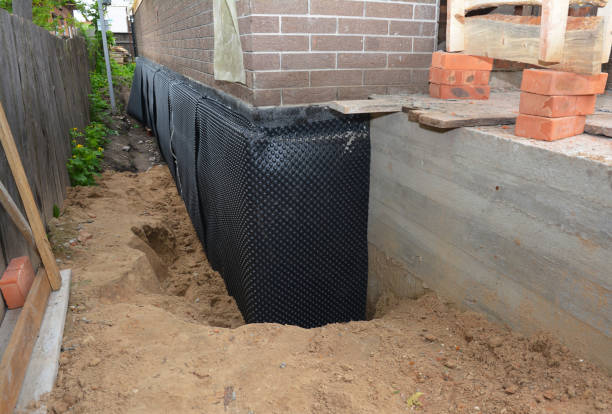 Happy homeowners after waterproofing job in Mecca